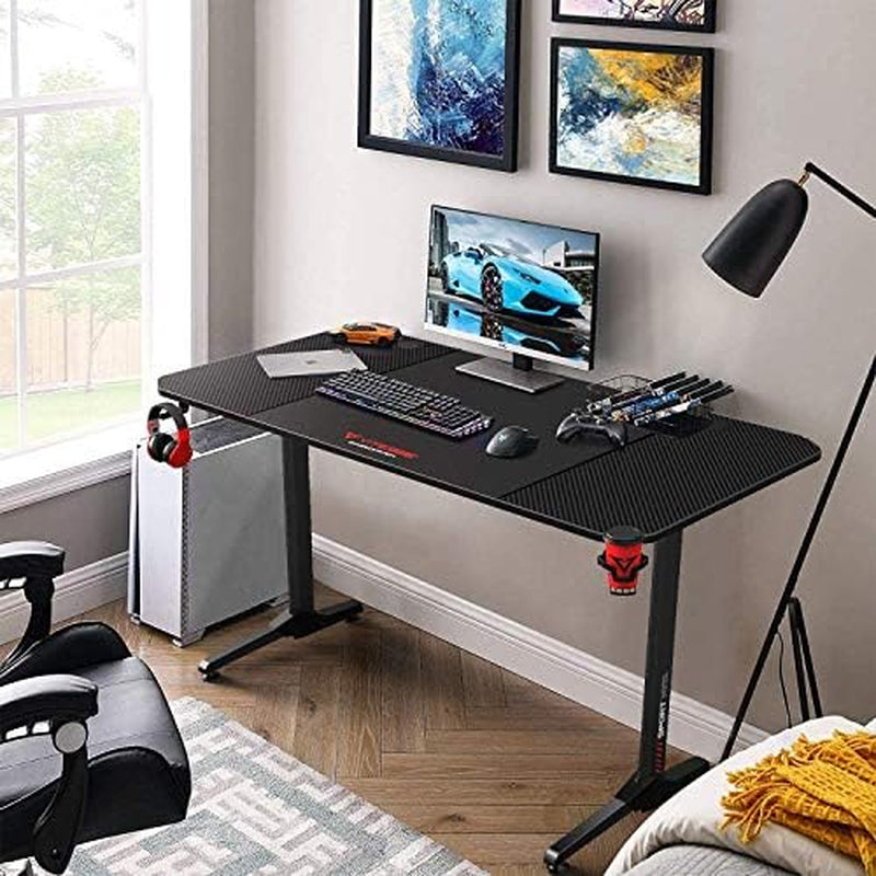 63 Inch Ergonomic Gaming Desk, T-Shaped Office PC Computer Desk with Desk Mouse Pad, Gamer Tables Pro with USB Gaming Handle Rack, Stand Cup Holderandheadphone Hook (63 Inch, Black)